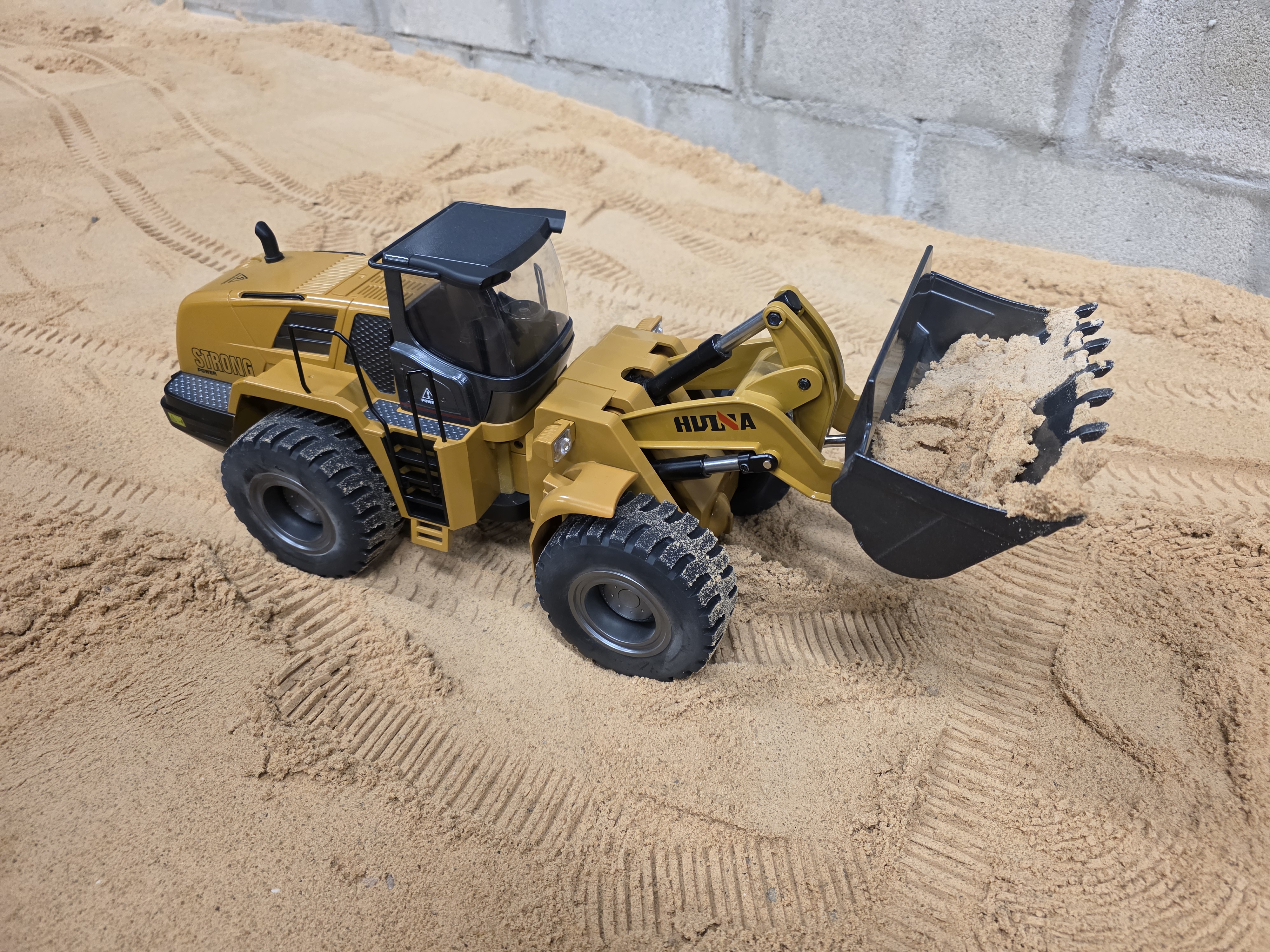 Kids playing with RC construction vehicles