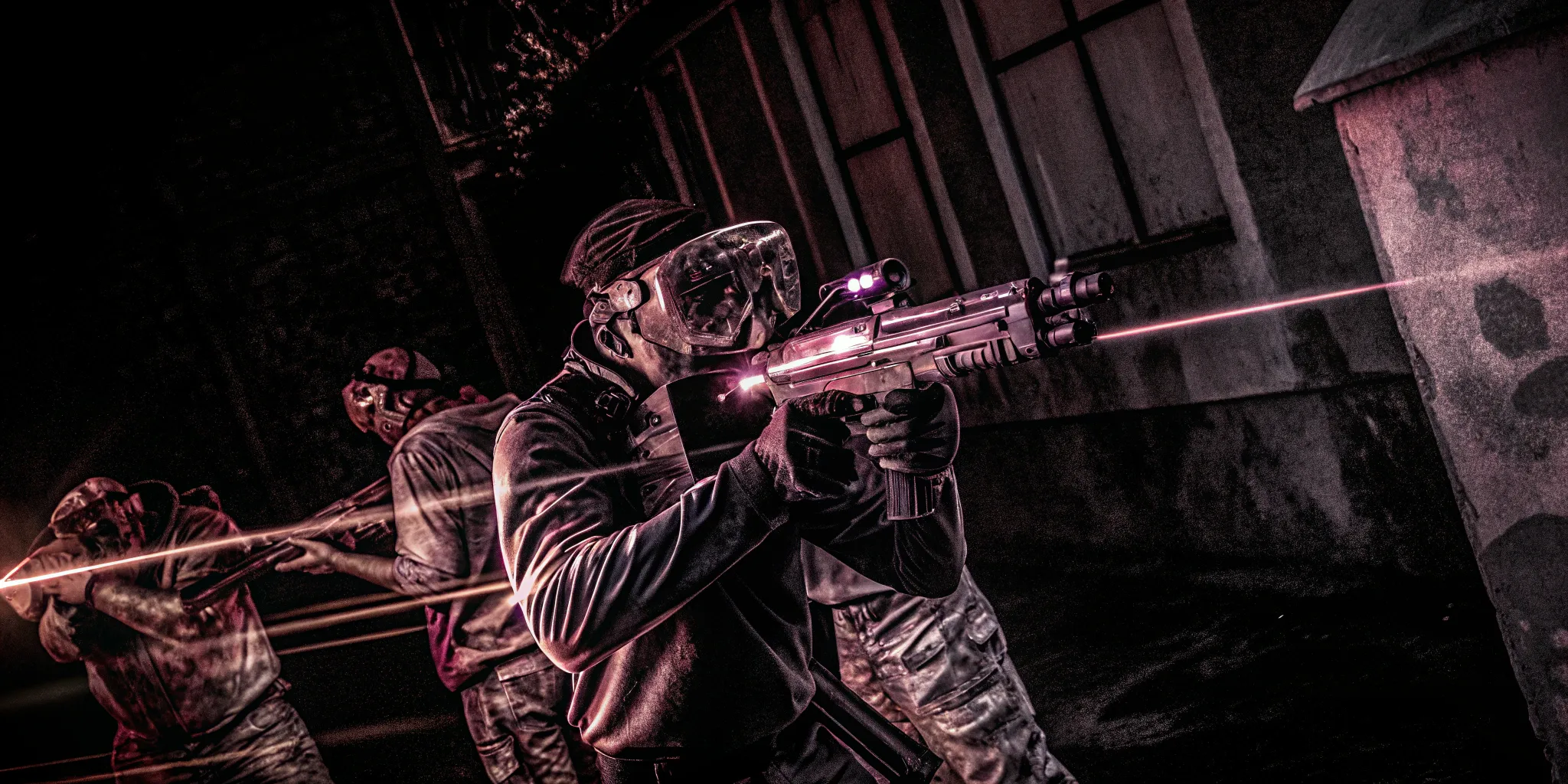 Players in a virtual reality game shooting at a horde of approaching zombies