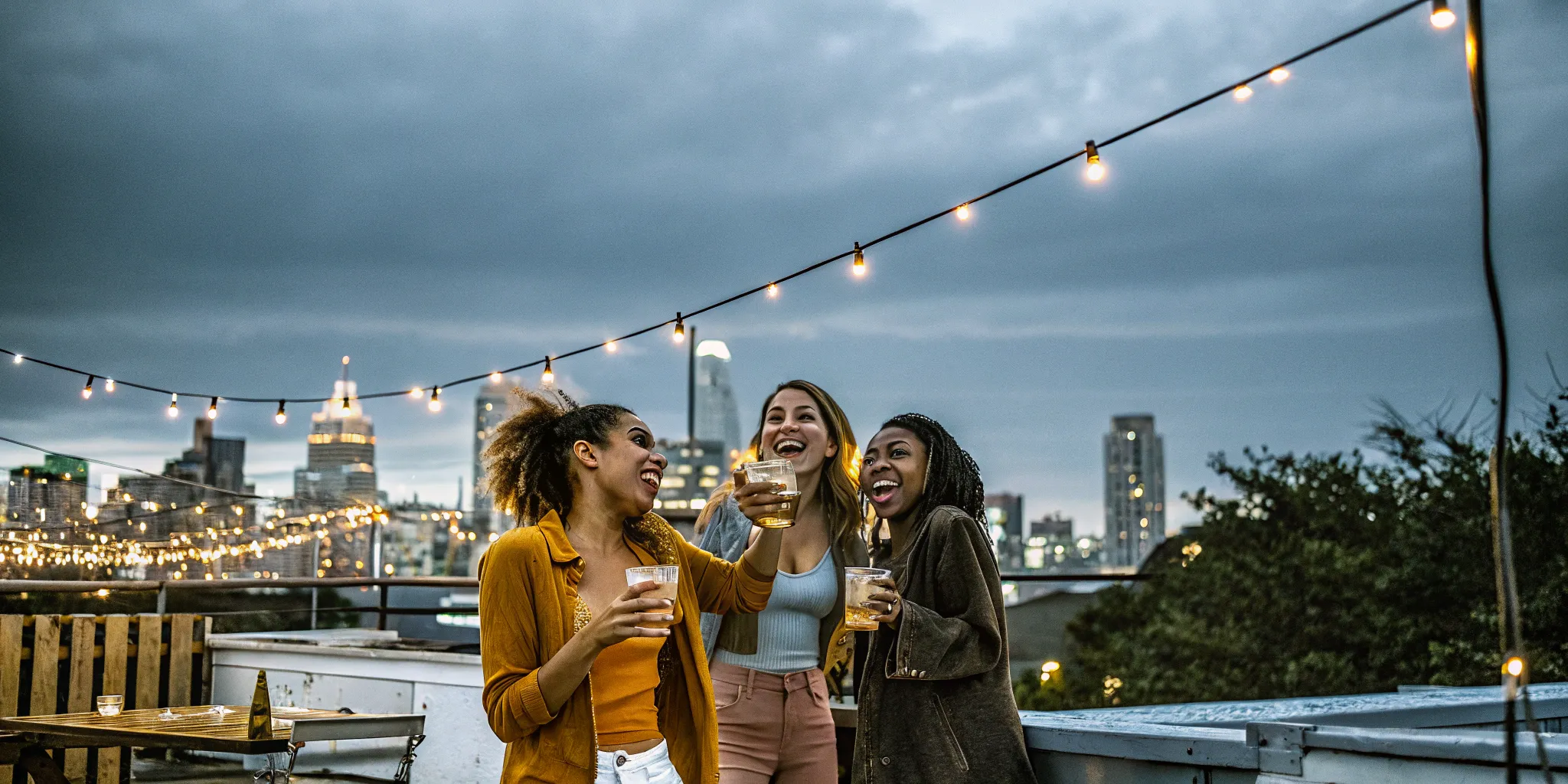 Friends toast drinks at an Austin bachelorette party